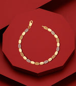 Dual-Tone Gold Bracelet with Textured Wave Motif