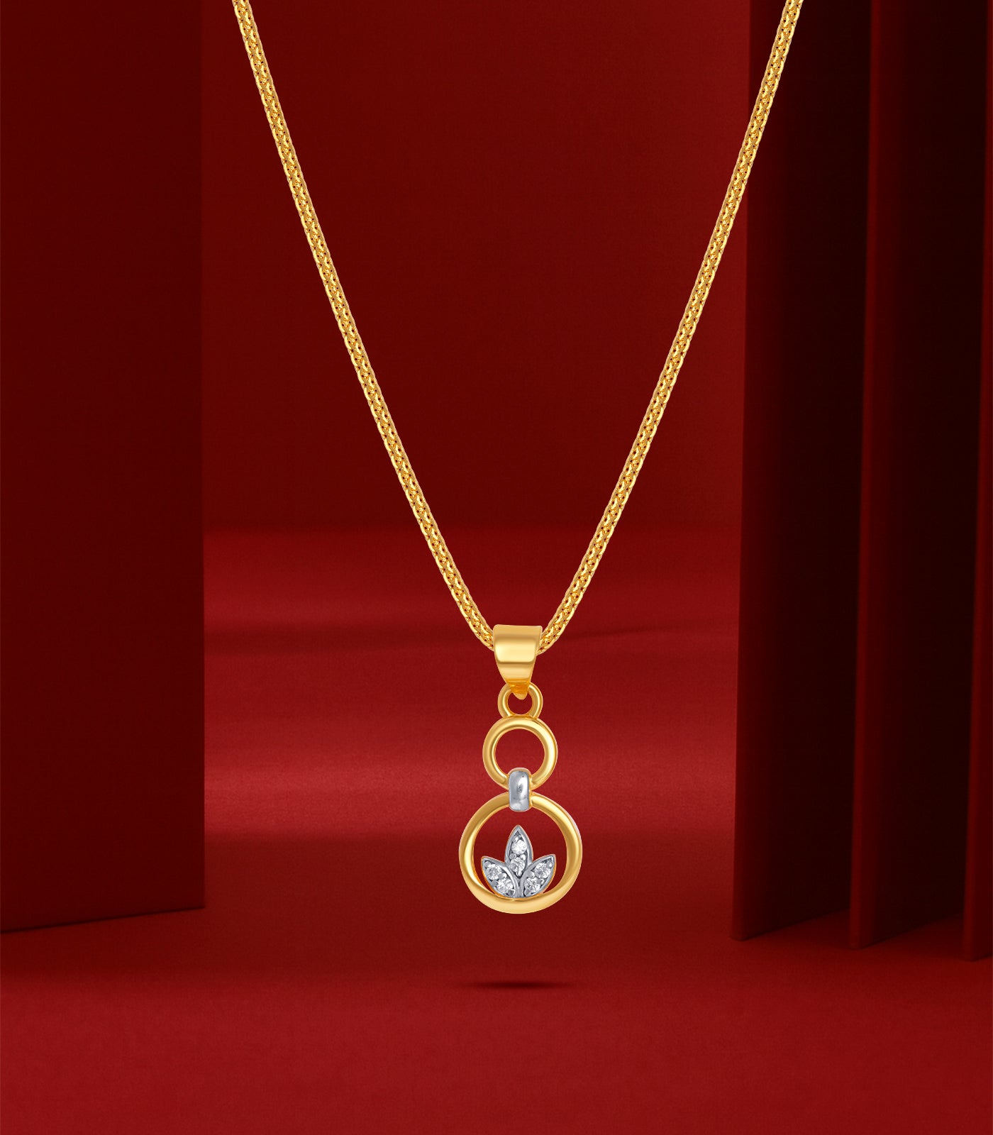 Stone Studded Leaf Gold Pendant