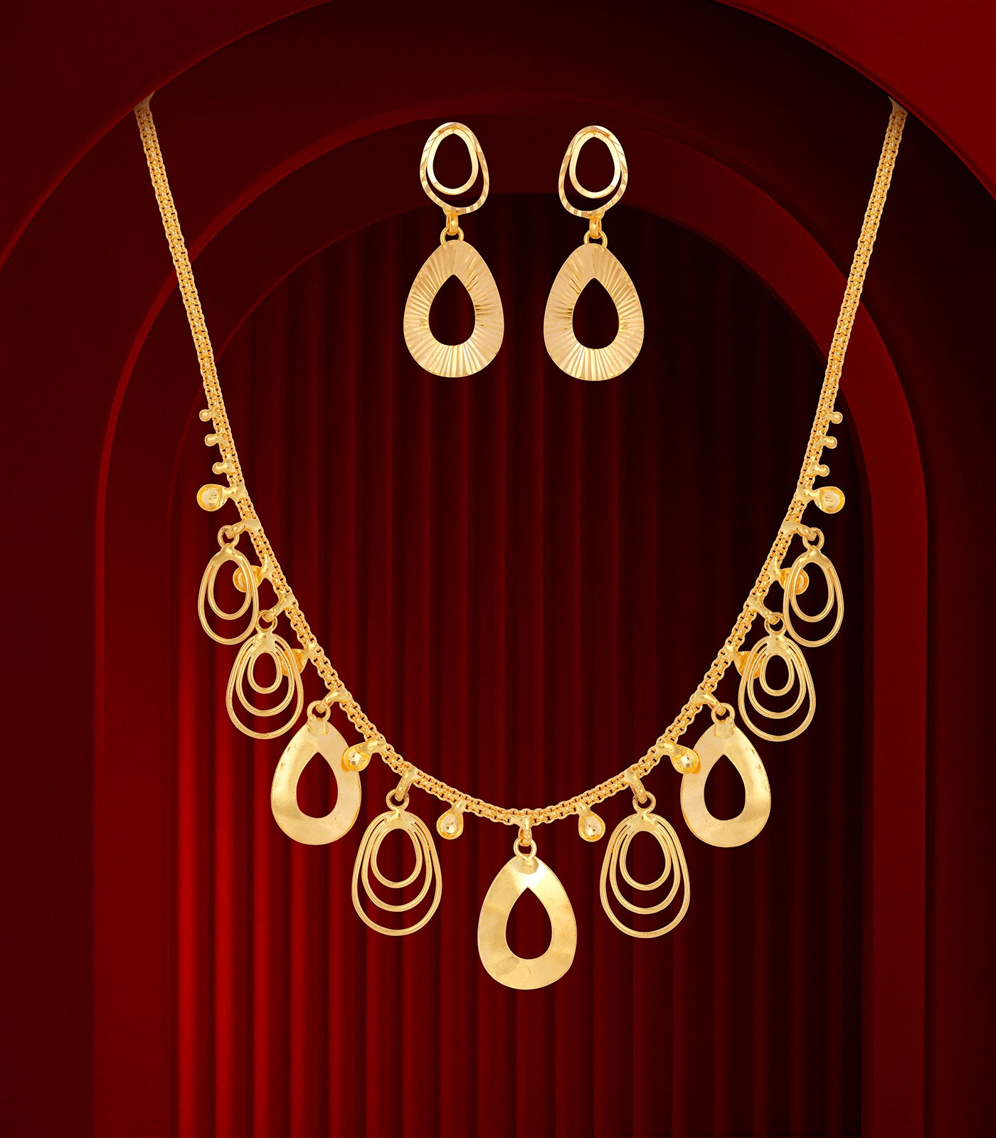 Radiant Oval Drops Gold Necklace Set