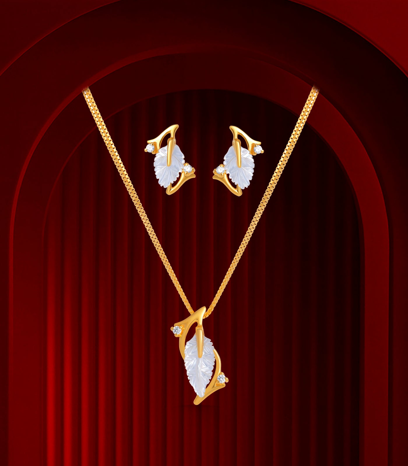 Leaf shaped pearl pendant set