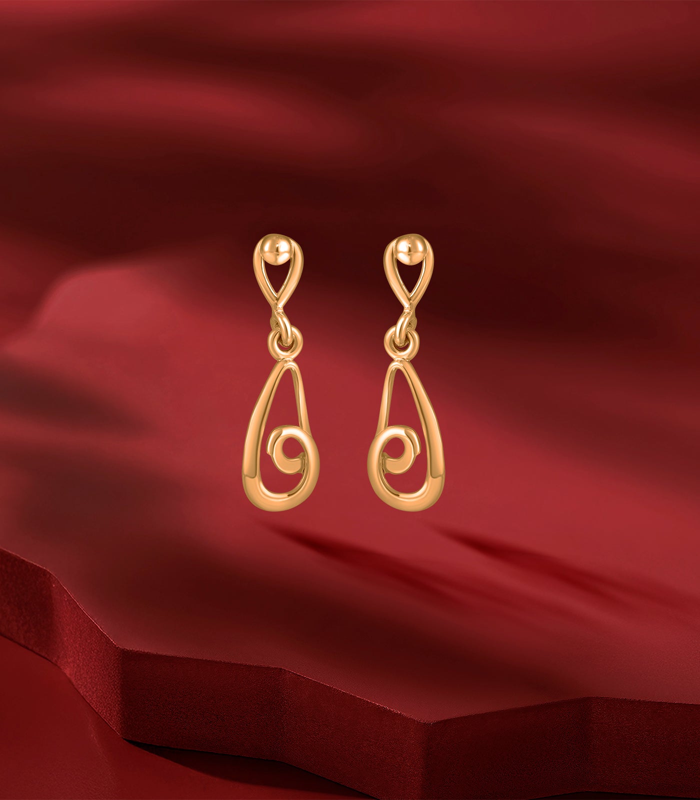 Dangling Swirls Gold Tops