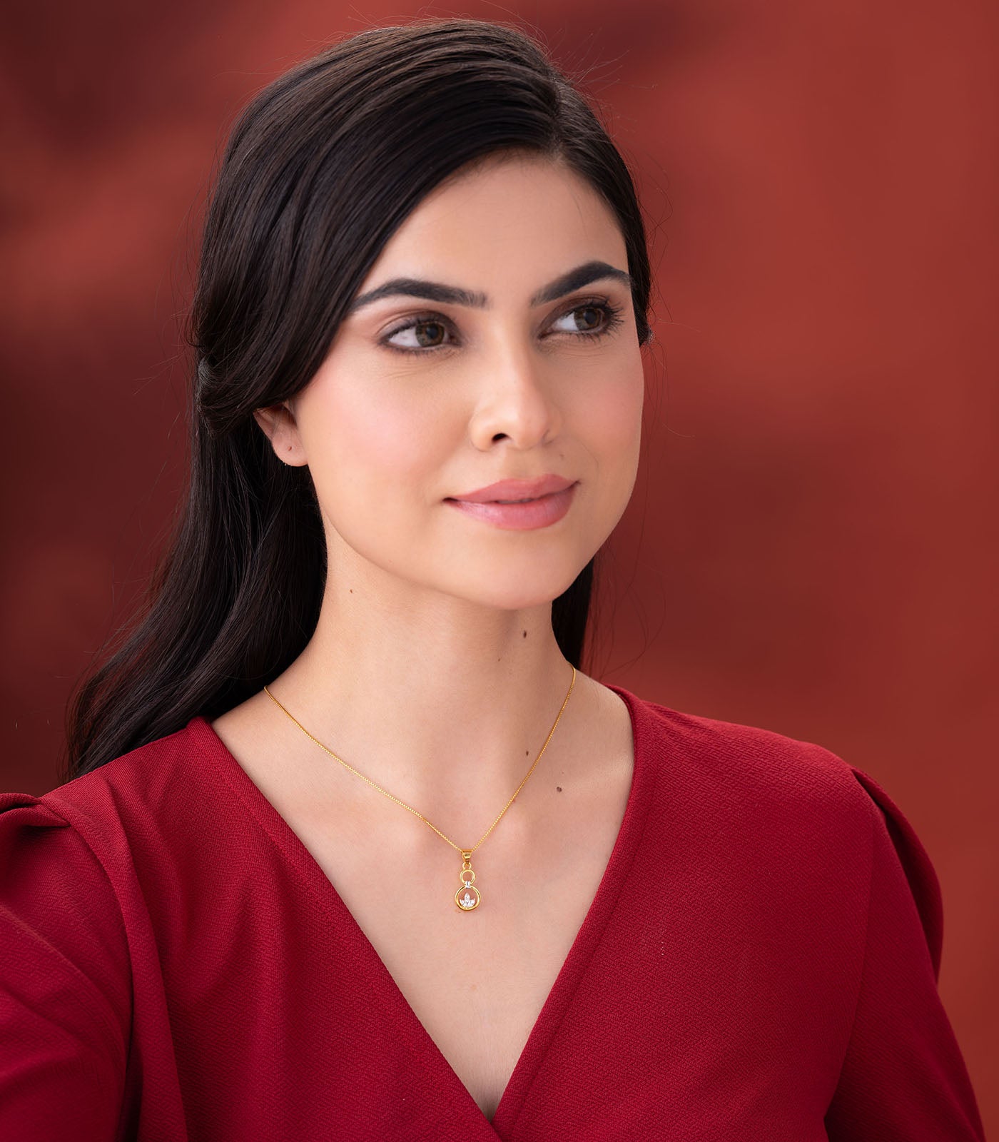 Stone Studded Leaf Gold Pendant